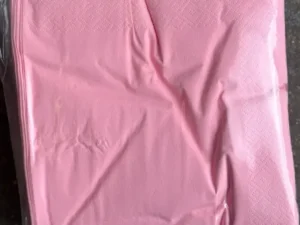 Pack of pastel pink napkins.