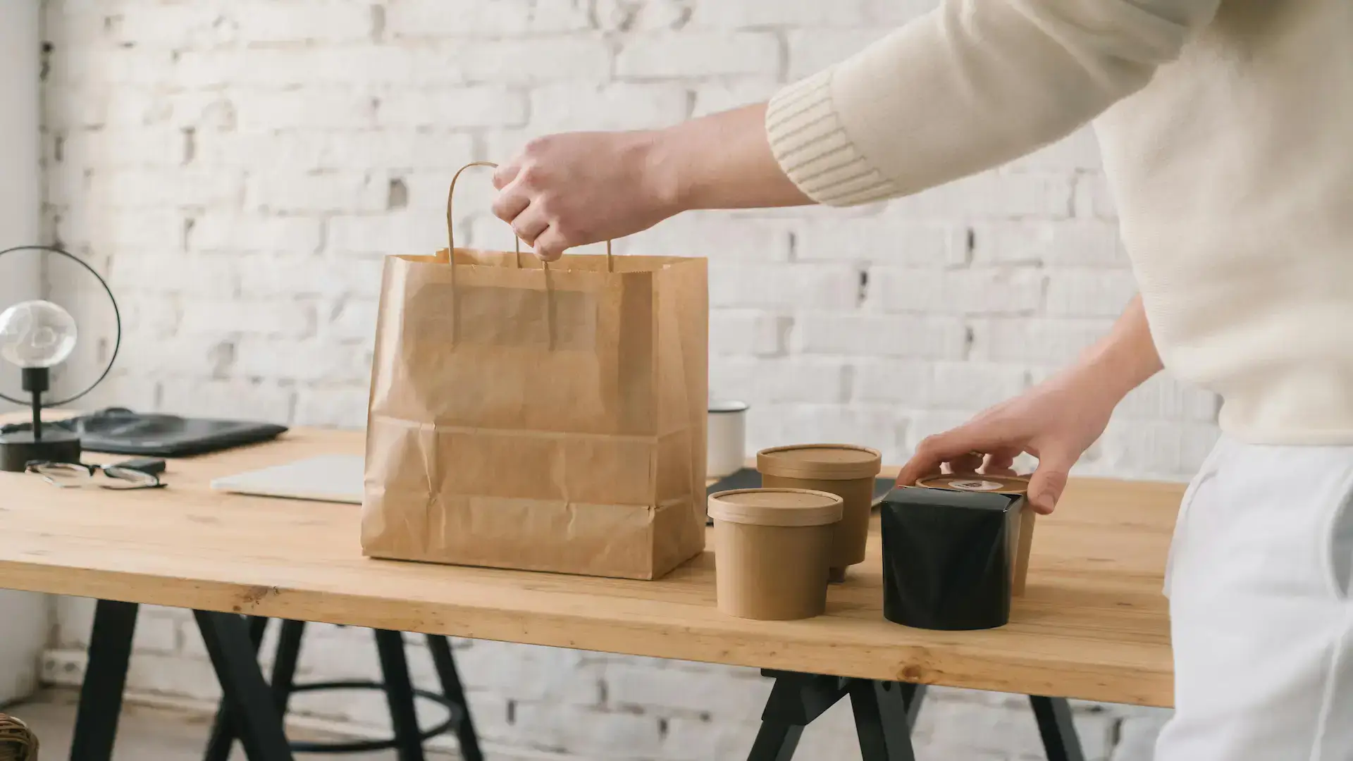 A Man Holding Takeaway Cardboard